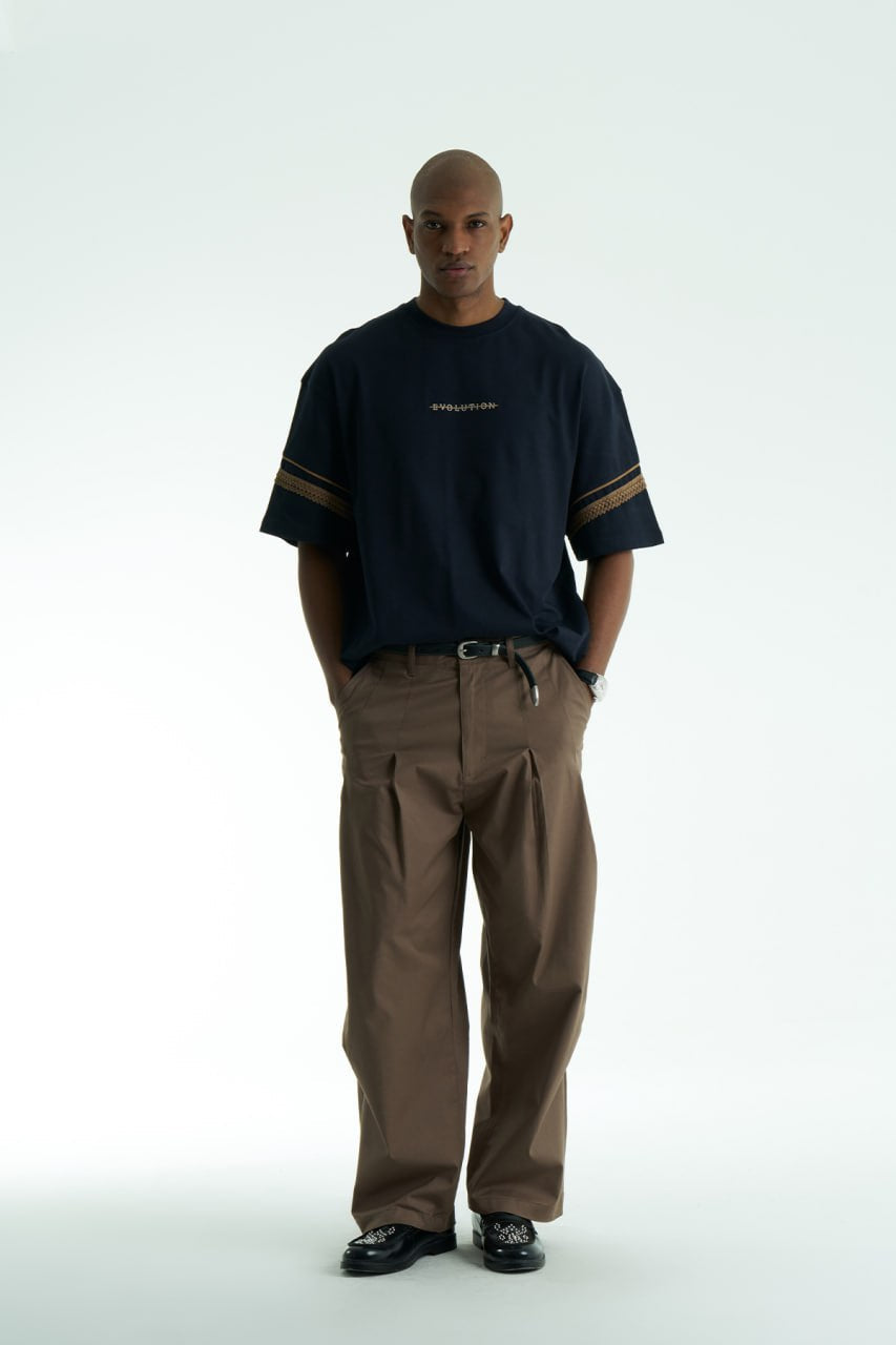 Navy Evolution oversized crewneck graphic T-shirt with sleeve trim and ornate back print in black, white, navy, and cream