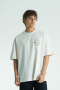 White Oversized Sam graphic T-shirt with ornate back print and rhinestone-style detailing, shown in white, black, brown and navy