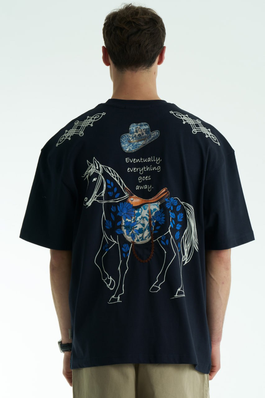 Navy Oversized graphic T-shirt with chest print and large back horse-and-hat artwork reading “Eventually, everything goes away.”