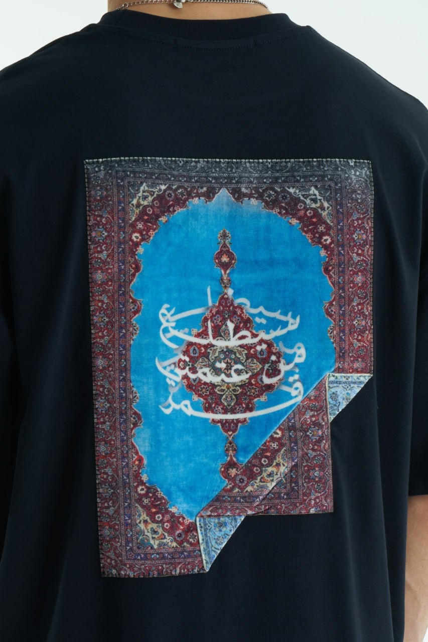 Black Son oversized crewneck graphic T-shirt with small chest logo and large tapestry-style back print, shown in brown, cream, and black