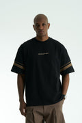Black Evolution oversized crewneck graphic T-shirt with sleeve trim and ornate back print in black, white, navy, and cream