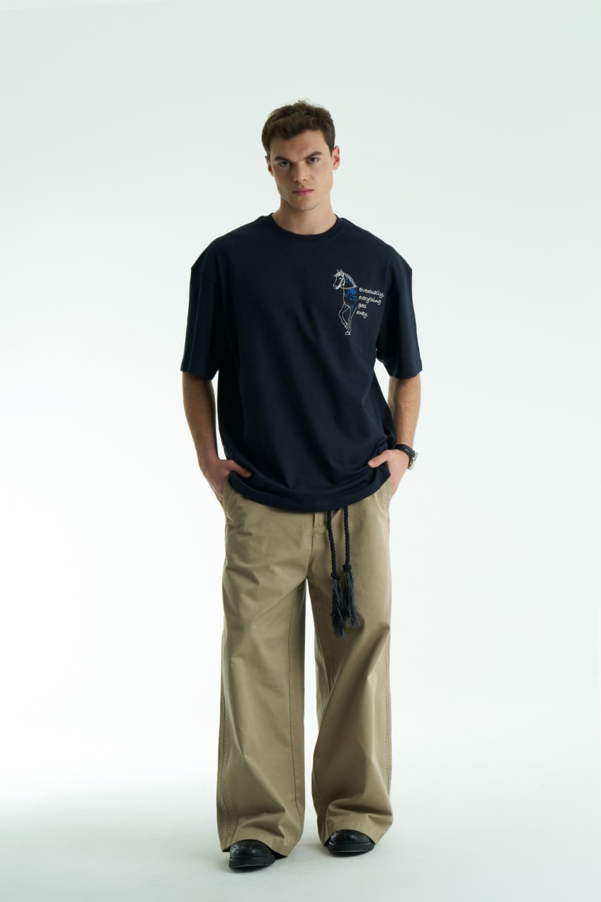 Navy Oversized graphic T-shirt with chest print and large back horse-and-hat artwork reading “Eventually, everything goes away.”