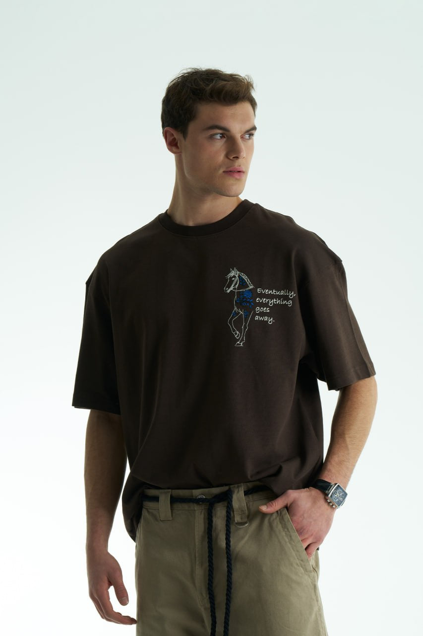 Dark Brown Oversized graphic T-shirt with chest print and large back horse-and-hat artwork reading “Eventually, everything goes away.”