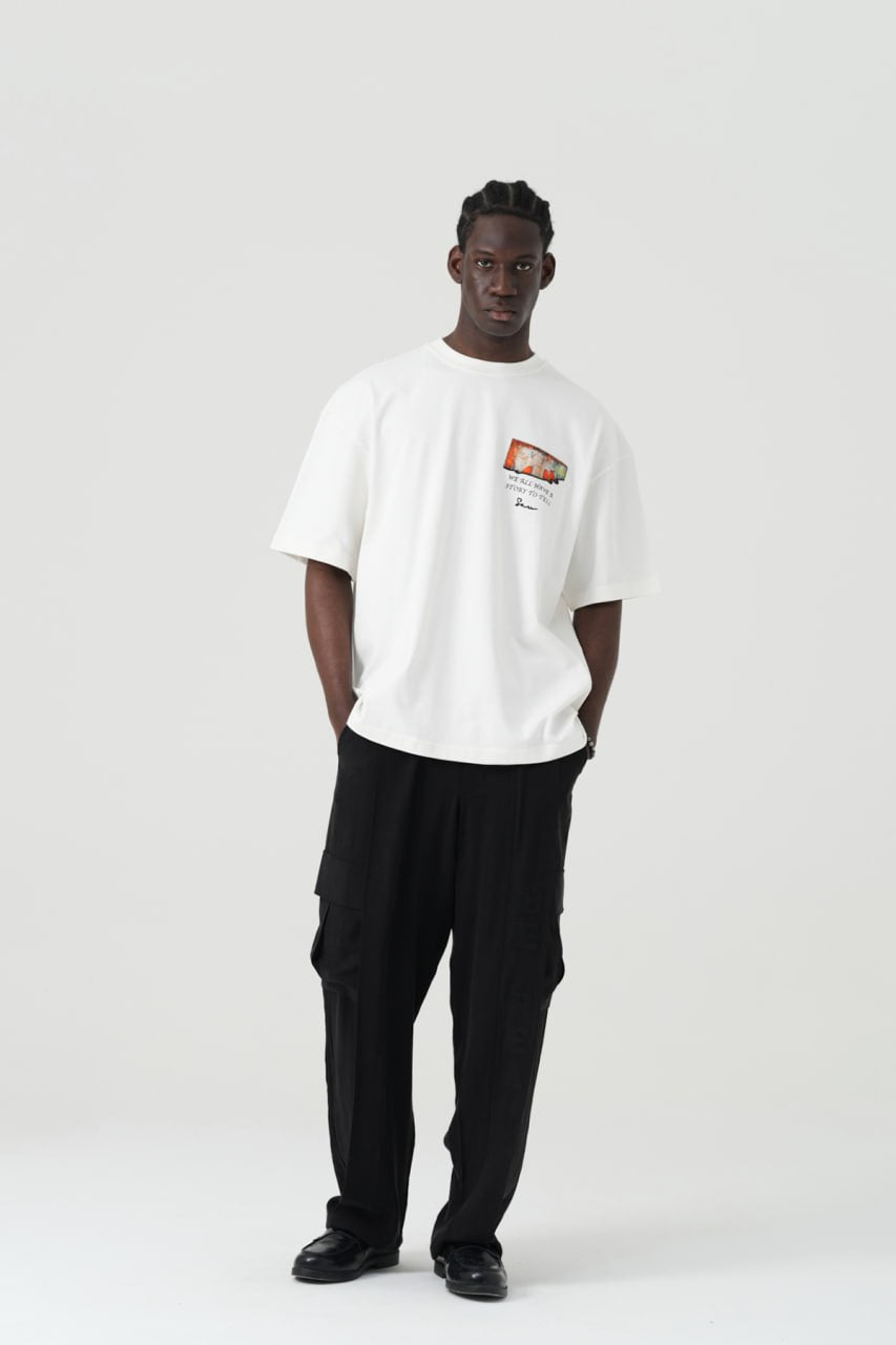 Black Oversized Graphic T-Shirt with “We All Have Stories to Tell” Back Print