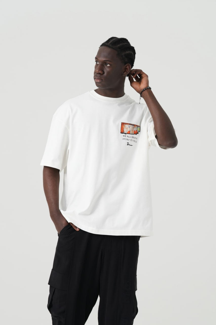 Black Oversized Graphic T-Shirt with “We All Have Stories to Tell” Back Print