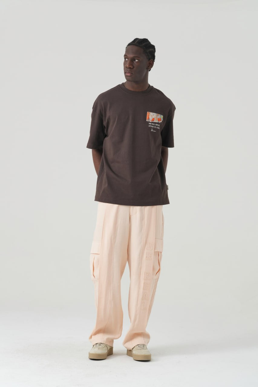 Black Oversized Graphic T-Shirt with “We All Have Stories to Tell” Back Print