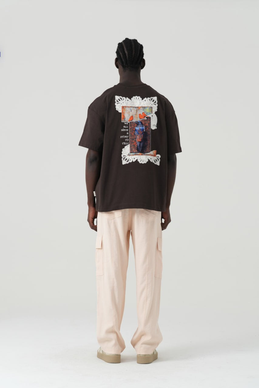 Black Oversized Graphic T-Shirt with “We All Have Stories to Tell” Back Print