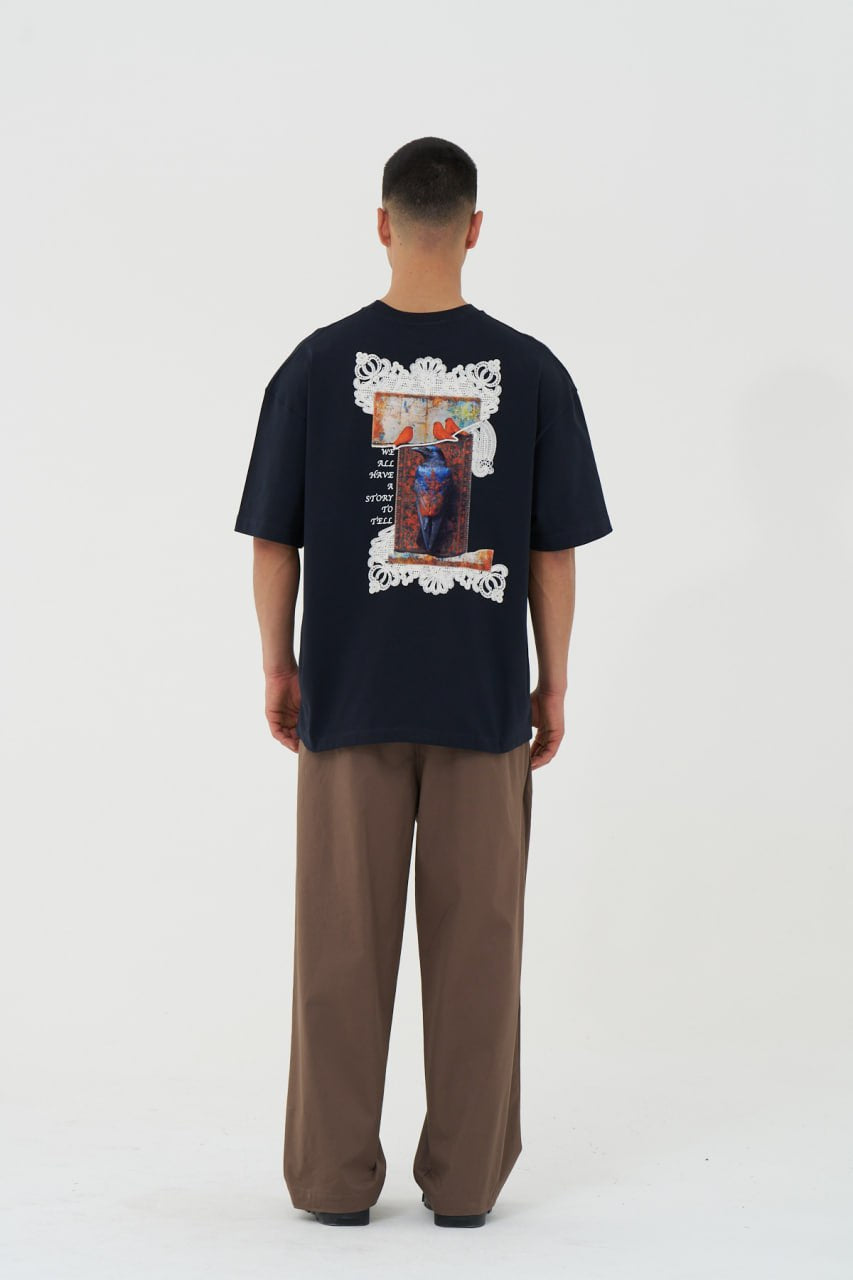 Black Oversized Graphic T-Shirt with “We All Have Stories to Tell” Back Print