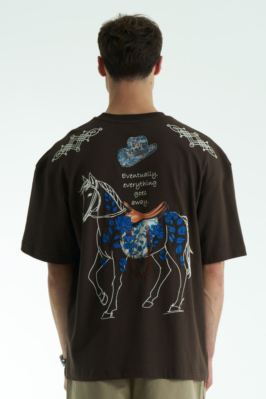 Dark Brown Oversized graphic T-shirt with chest print and large back horse-and-hat artwork reading “Eventually, everything goes away.”