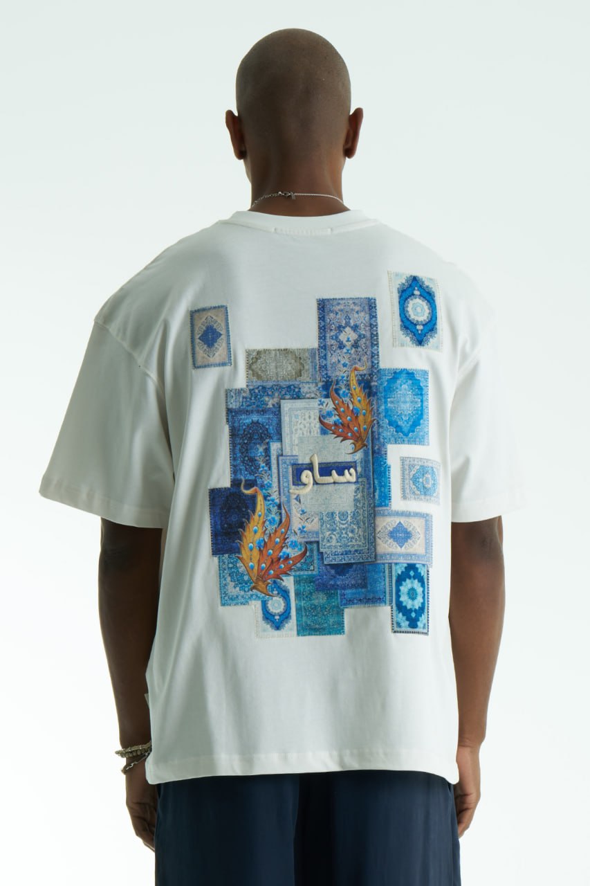 White Oversized SAVO graphic cotton T-shirt with small chest print and large blue tile-collage back print, shown in multiple colors