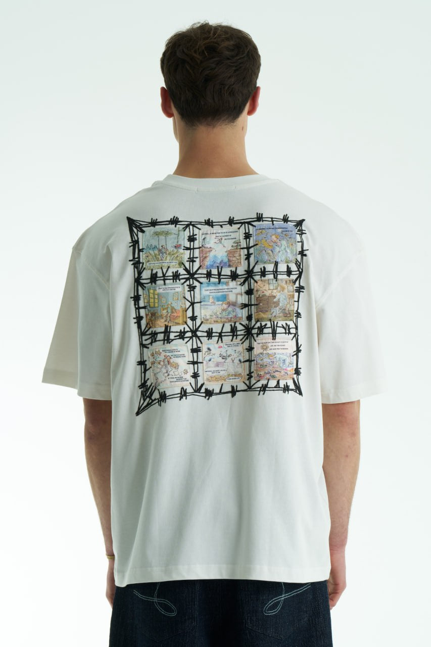 White Vincent oversized crewneck graphic T-shirt with small chest logo and large illustrated back print, shown in black, white and cream.