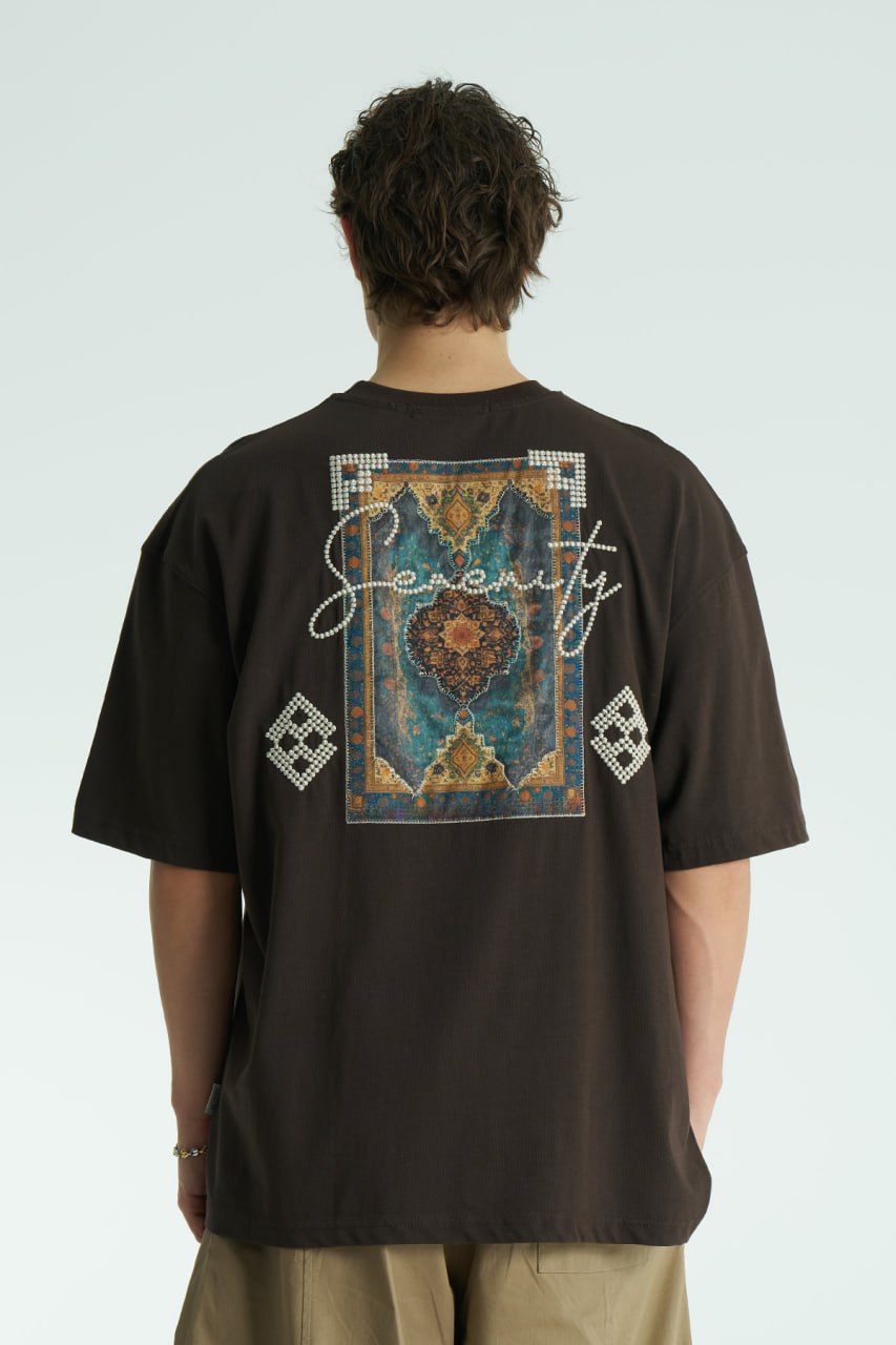 Brown Oversized Sam graphic T-shirt with ornate back print and rhinestone-style detailing, shown in white, black, brown and navy
