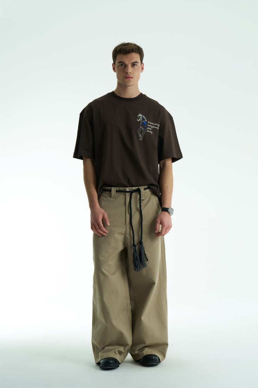 Dark Brown Oversized graphic T-shirt with chest print and large back horse-and-hat artwork reading “Eventually, everything goes away.”