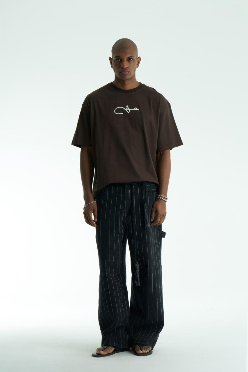 Dark Brown Oversized Haqi crewneck graphic T-shirt with calligraphy chest logo and large back rug-print panel in multiple colors