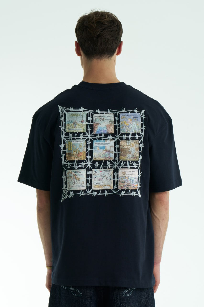 Black Vincent oversized crewneck graphic T-shirt with small chest logo and large illustrated back print, shown in black, white and cream.
