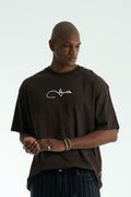 Dark Brown Oversized Haqi crewneck graphic T-shirt with calligraphy chest logo and large back rug-print panel in multiple colors