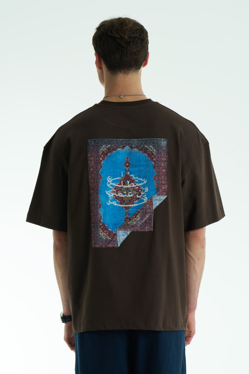 Brown Son oversized crewneck graphic T-shirt with small chest logo and large tapestry-style back print, shown in brown, cream, and black