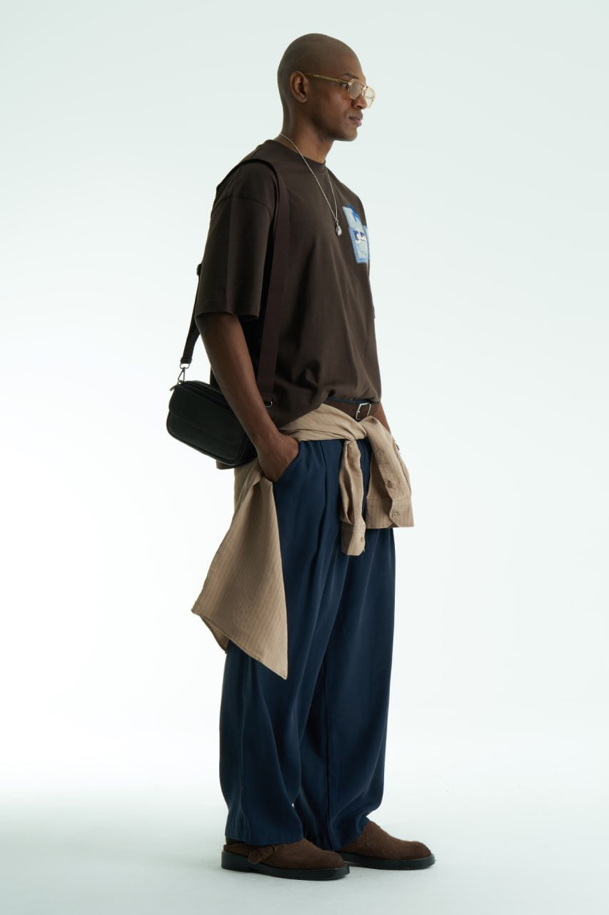 Brown Oversized SAVO graphic cotton T-shirt with small chest print and large blue tile-collage back print, shown in multiple colors