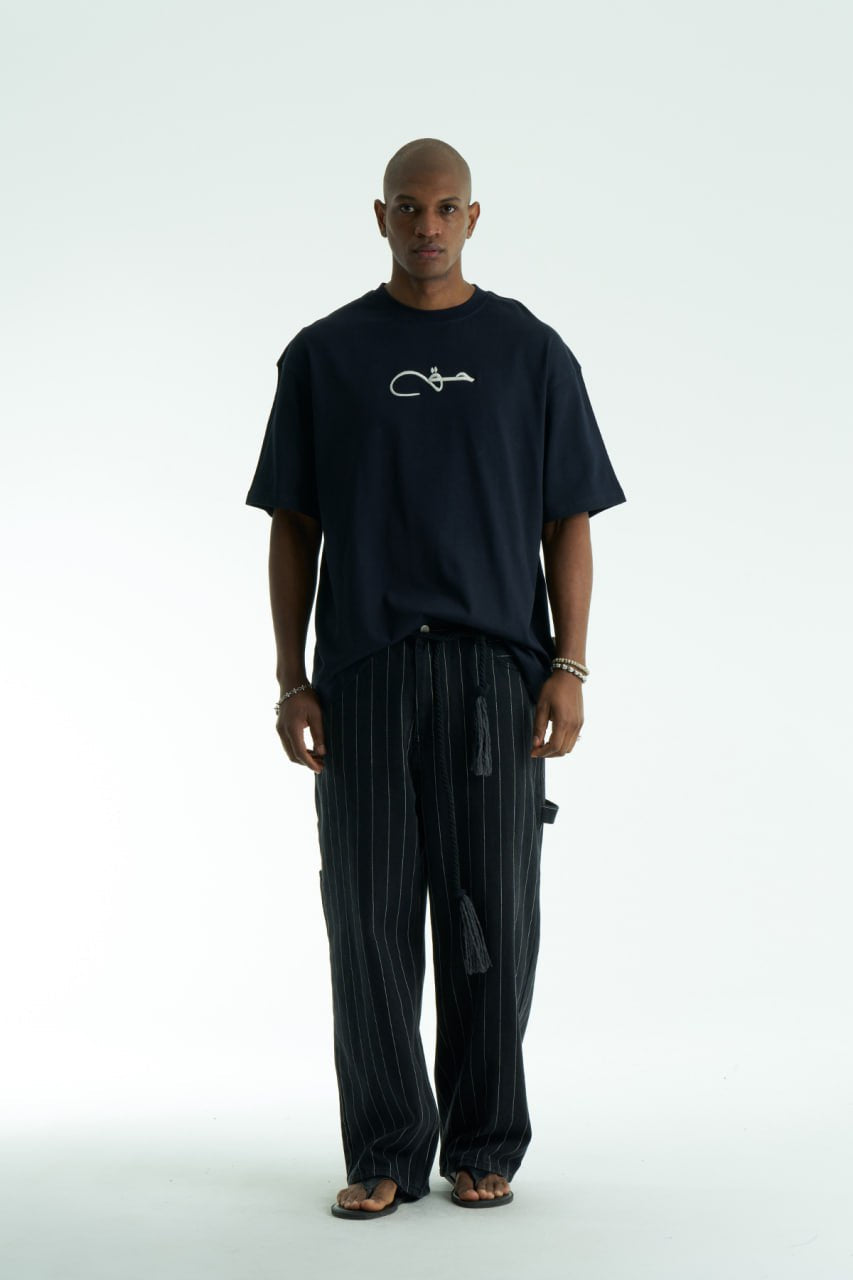 Navy Oversized Haqi crewneck graphic T-shirt with calligraphy chest logo and large back rug-print panel in multiple colors